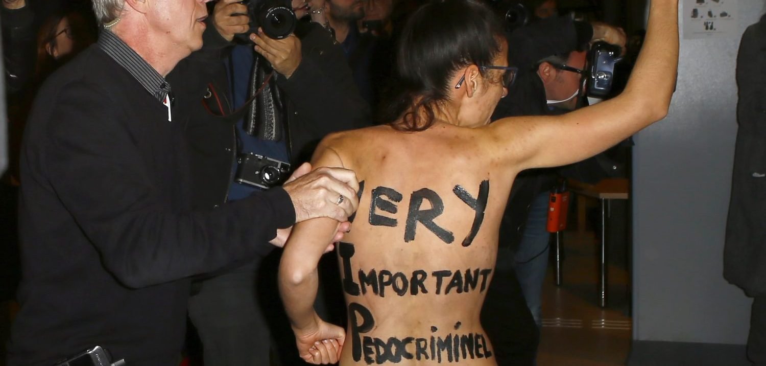 ‘Pedocriminal’ – Topless Feminists Protest Polanski Event
